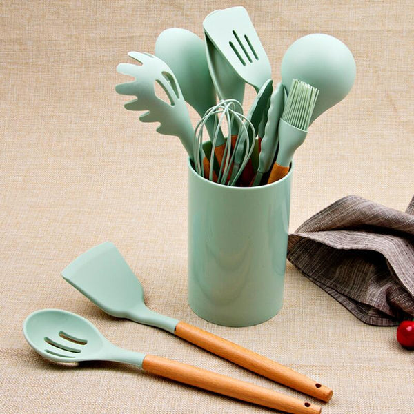 11 Piece Silicone Kitchen Utensil Set in mint green, featuring various tools for cooking and serving.