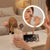 LED Makeup Mirror with Rotating Cosmetic Organizer featuring a user applying makeup and using a phone stand.