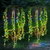 4-Piece Garden Solar Lights illuminating a garden with vibrant greenery and colorful accents at night.