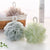 2 Piece Durable and Soft Shower Ball Sponge in pastel colors, perfect for gentle scrubbing and lathering during baths.