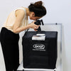 User capturing product photos with 40x40cm LED Deep Professional Photography Studio Light Box Set.