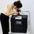 User capturing product photos with 40x40cm LED Deep Professional Photography Studio Light Box Set.