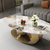 Heritage Marble Coffee Table featuring a polished marble top and a stylish golden base for elegant living room decor.