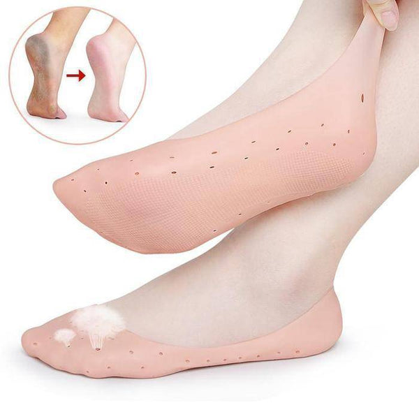 Silicone Moisturizing Sock on feet demonstrating soft and hydrated skin, promoting foot care and comfort.