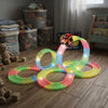 Luminous Rail DIY Set with colorful glow-in-the-dark track loops and a toy car racing on it.