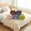 Colorful collection of Animal Plush Pillows arranged on a cozy bed, perfect for decor and comfort.