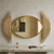 Luxury Oval Wall Mirror in gold with decorative side details, enhancing the elegance of interior spaces.