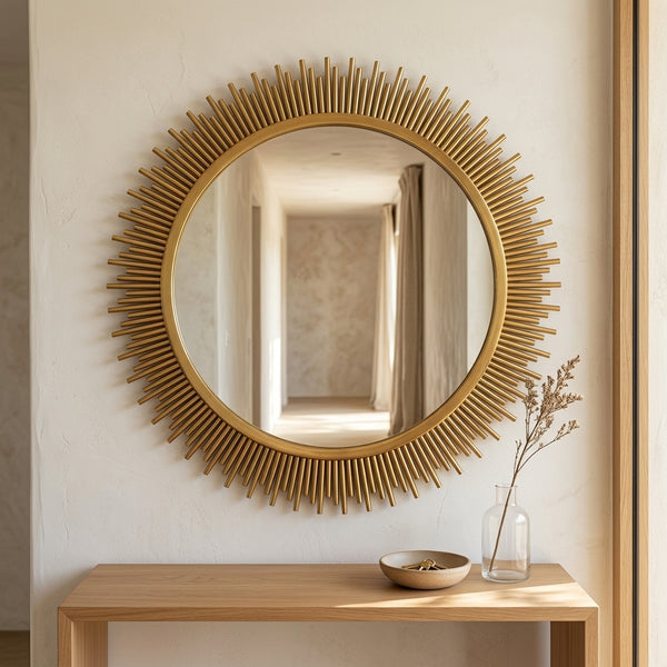 Stylish Sunburst Decorative Round Wall Mirror reflecting light in a modern hallway setting.