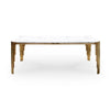 Mirren Luxury Marble Dining Table featuring a sleek white marble top and striking metallic legs for modern elegance.