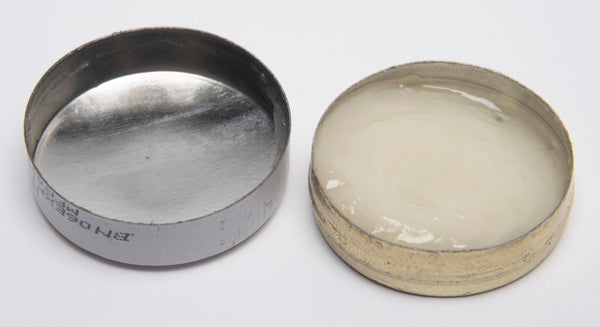 Mentholtianlan Medicated Relief Balm open container showing the balm inside for muscle and joint discomfort.