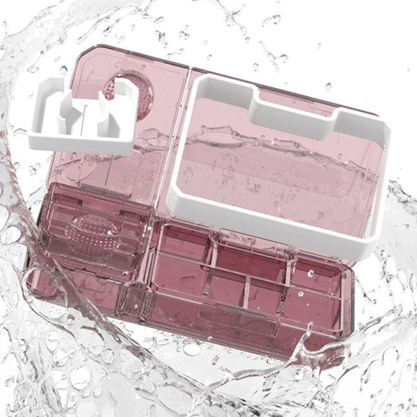 Portable Pill Organiser in pink, featured in splash of water, designed for easy medication sorting and accessibility.