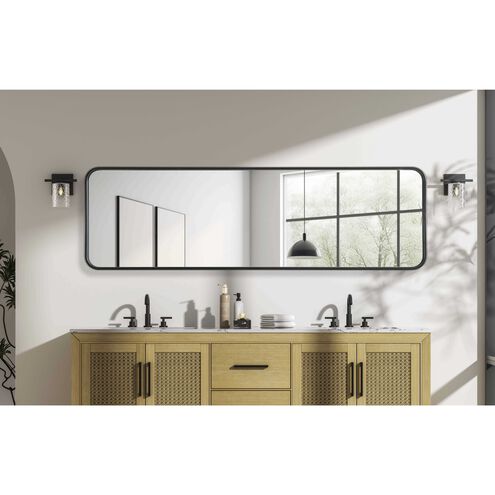 Full Length Leaner Floor Mirror above a stylish bathroom vanity featuring modern fixtures and lamps.