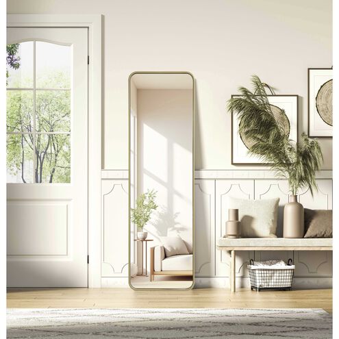 Full Length Leaner Floor Mirror displayed in a modern interior with plants and decor, enhancing the room's brightness.