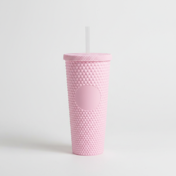 Solid Color Plastic Tumbler With Straw in pink with a textured design and a clear straw.