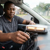 Man installing Trucks Strobe Flashing Side Light Bar in vehicle for enhanced roadside visibility.