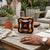 1500W Flower Shape PTC Ceramic Fan Heater on a table with a cup, snacks, and a watch in an outdoor setting.