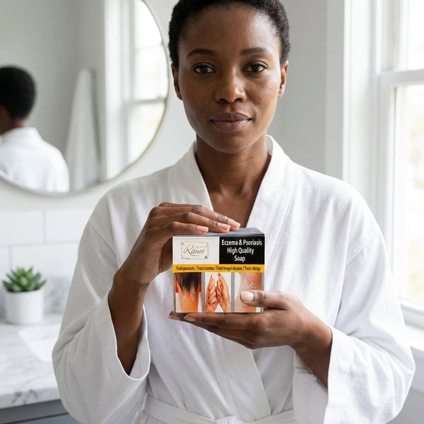 Eczema And Psoriasis Soap held by a woman in a white robe, showcasing its soothing benefits for irritated skin.