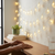 Ramadan Eid String Lights Decoration displayed on a wall with warm LED light moons and lanterns enhancing a cozy atmosphere.