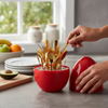 Gold Flatware Set arranged in a stylish red container, showcasing the upscale cutlery collection.