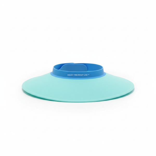 Baby Shower Cap designed to keep water and shampoo out of baby's eyes, made from soft, flexible, BPA-free materials.
