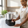 600W 4L Fufu Heating Machine YAM Pounder in a modern kitchen with a user adjusting the settings.