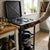 Person using 4 Burners Portable Butane Gas Stove in a modern kitchen for cooking.