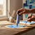 Acrylic Paint 75ml - Cobalt Blue being used on a palette with a paintbrush in a bright studio.