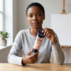 Acrylic Paint 75ml - Flesh in the hands of a woman sitting at a table, showcasing the product.