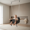 Infant Swing Toddler Indoor & Outdoor Wooden Baby Swing in modern living room with baby enjoying the swing.