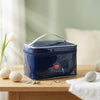 Patent Leather Hand-Held Toiletry Bag in navy blue with a stylish design, perfect for organizing makeup essentials.