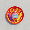 Soap Bubble Maker 170ml with bubble solution and playful wands on a vibrant red tray.