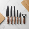 5 Piece Professional Antibacterial Kitchen Chef Knife Set displayed on a marble countertop with wooden cutting boards.