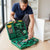 Man examining tools in a 20-Piece Household Hand Tool Starter Kit while assembling furniture.