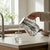 High Borosilicate Glass Cold Water Kettle pouring into a glass on a kitchen counter.