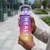 4-in-1 Motivational Gradient Water Bottle Set in hand, promoting healthy hydration with vibrant gradient design.