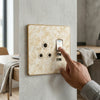 Golden 3-Pin UK Standard Waterproof Wall Socket with USB ports and a modern design, enhancing home electrical safety.