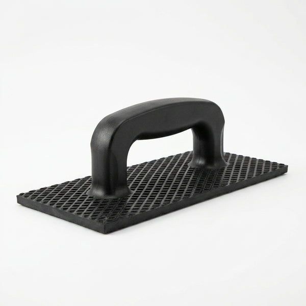 Abrasive Sanding Float for Insulation Levelling with a textured surface and ergonomic handle.