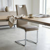 Cantilever Chrome Bar Stool with Backrest set in modern kitchen, featuring chrome frame and supportive backrest.