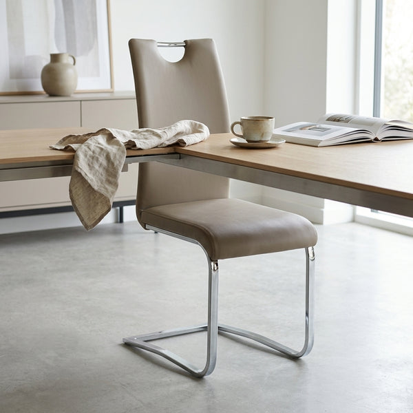 Cantilever Chrome Bar Stool with Backrest set in modern kitchen, featuring chrome frame and supportive backrest.