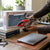 Beginner-Friendly Electric RC Jet Airplane being held next to a laptop and books on a workspace.