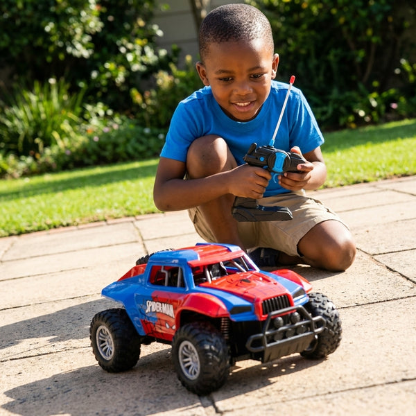 A boy enjoying the outdoors playing with a Children's Off-Road Jeep Ride Toy Car, navigating in a garden setting.
