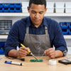 40W Electric Soldering Iron and Welding Repair Kit in use for circuit board repair by a technician.
