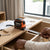 High Visibility Impact Resistant Tape Measure on a wooden drawer, measuring accurately for construction.