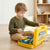 Child exploring tools in a 2-in-1 Portable Tool Set Toy Backpack, promoting creative play and problem-solving.