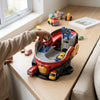 Child playing with Creative Garage Fire Rescue Car Track on a wooden table, featuring mini rescue cars and a multi-level design.