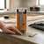 F30 18 Gauge Brad Nails packaging with a hand pointing, ideal for pneumatic nail guns and woodworking projects.