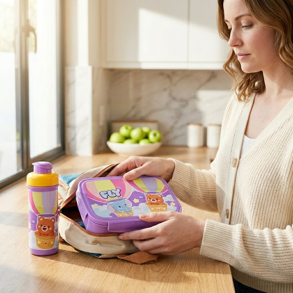 BPA Free Kids Water Bottle and Bento Lunch Box on kitchen counter, ready for school with healthy snacks.