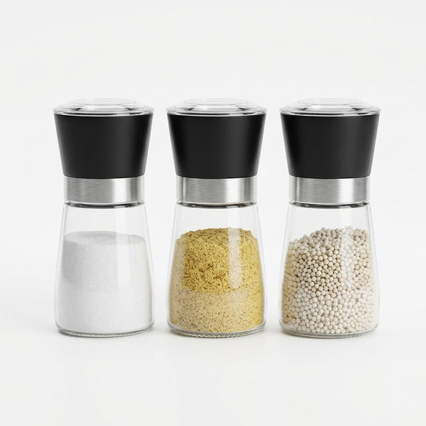 Stainless Steel Salt and Pepper Grinder set with three jars containing salt, spices, and seasonings.