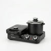 5-in-1 Multifunctional Mini Breakfast Machine in black with a pot and grill plate for versatile cooking.