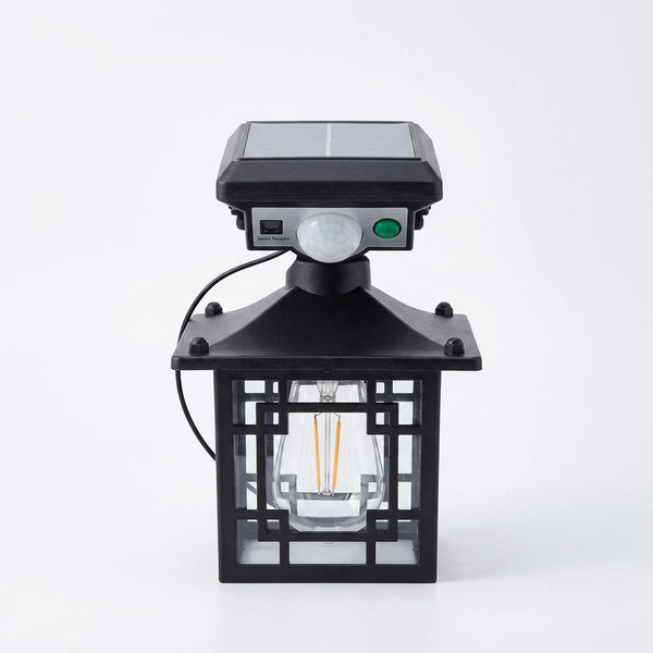 Outdoor Solar Lamp Waterproof Human Induction Light with solar panel and motion sensor, ideal for outdoor security.